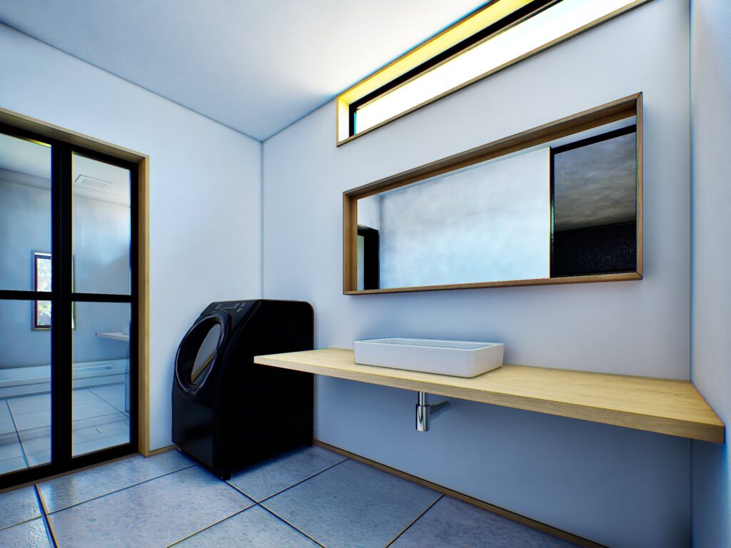 広々とした木目のカウンターと横長の鏡を合わせ、朝の身支度が楽しみになるようなサニタリー空間を作りました。古い空き家の面影を感じさせない、清潔感あふれる仕上がりです。