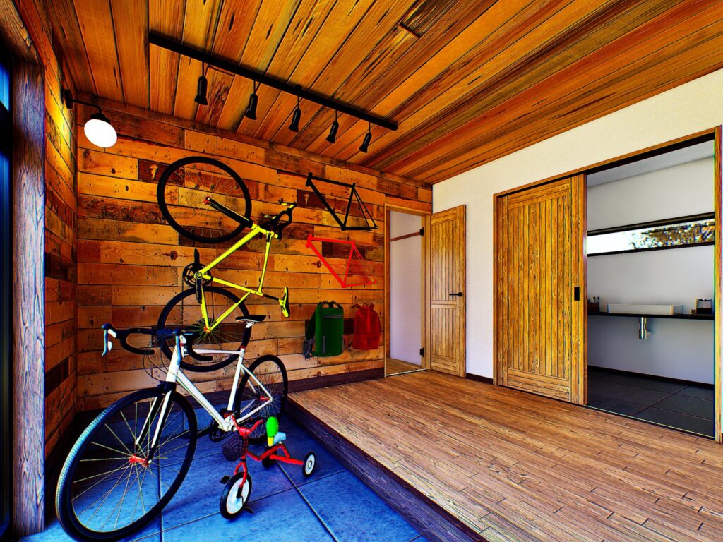 駿河区下川原の広い玄関を活かし、自転車を壁掛けできる木質空間に仕上げました。空き家特有の暗さを照明計画で克服し、資産としての魅力を再定義。断熱材と無垢材の床が、冬の足元の冷え込みを優しく和らげます。