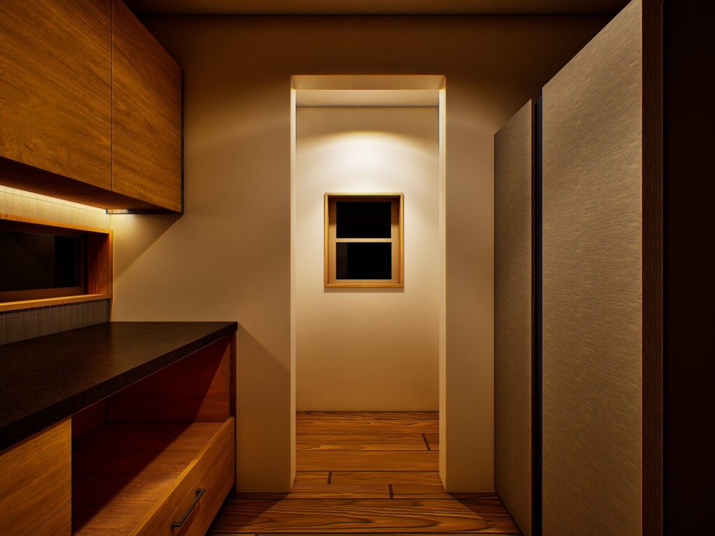 木目の作業台と背の高い収納が向かい合う奥まった空間の情景
