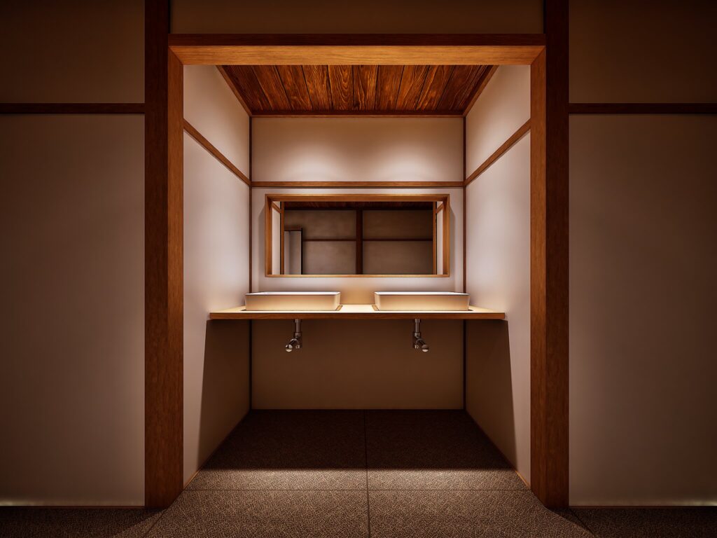 家族で並んで使える機能的な造作洗面台。ライティングが木目を美しく照らし、朝の身支度を贅沢な時間に変える素朴なリノベーション案です。